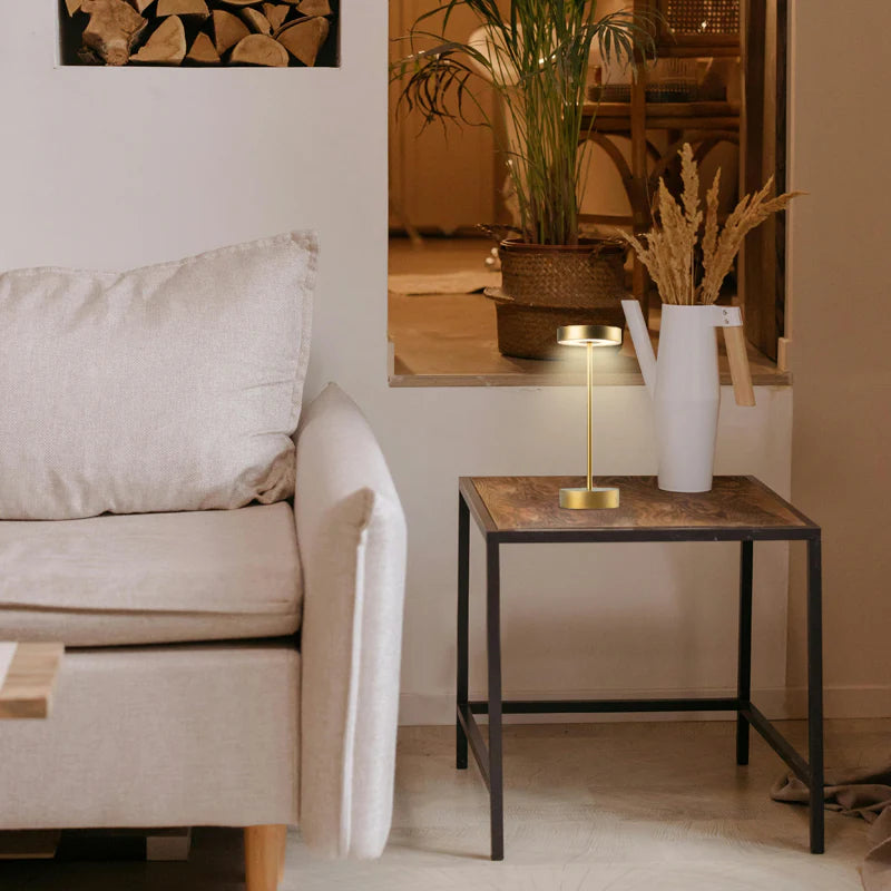 SPAZIO Standy Mini Rechargeable Desk Lamp – lamp on a side table beside a sofa