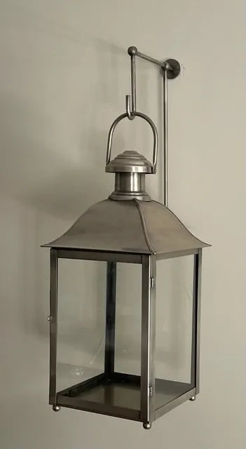 Classic Candle Lantern – lantern hanging from a wall hook