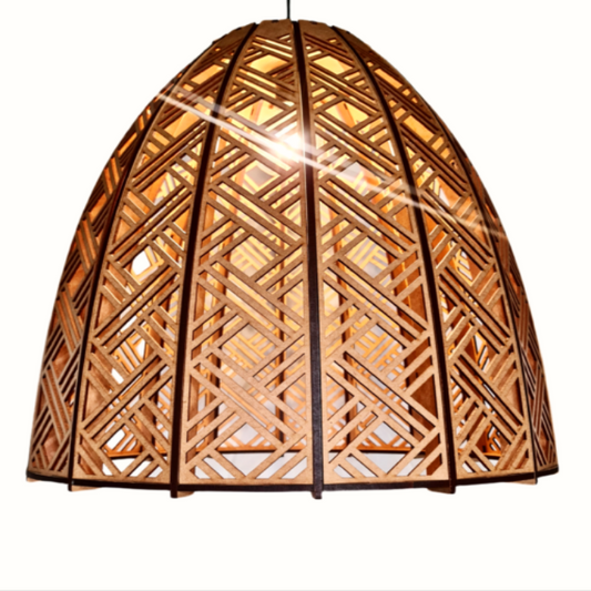 Honey Badger Ghana Panel Basket Pendant Light – lit shade showing the cut-out pattern
