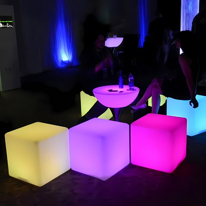LED RGB Colour-Changing Light Cube – lit cubes and a lit table at an evening party