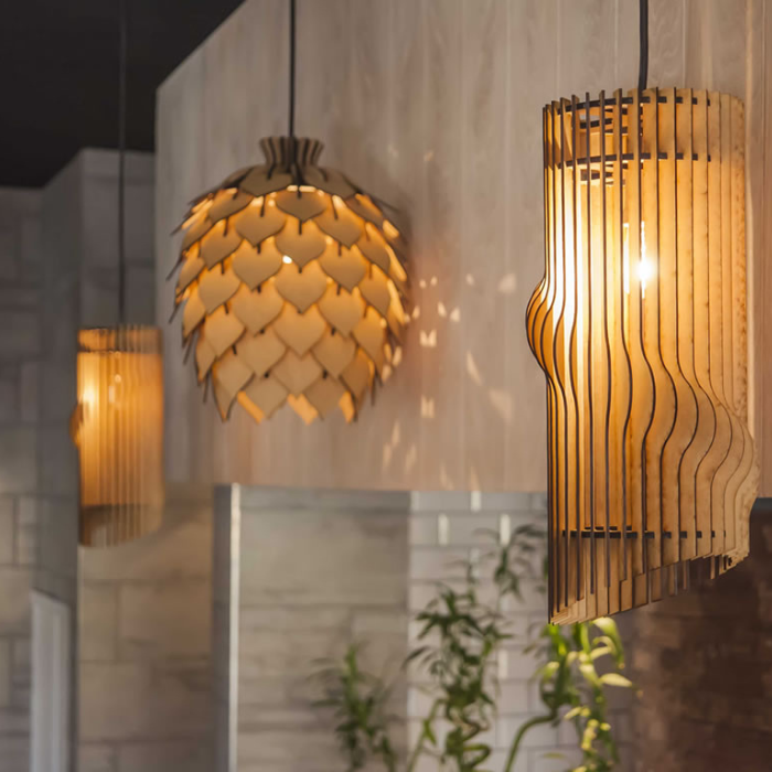 Honey Badger Tubo natural pendant lights over a kitchen counter