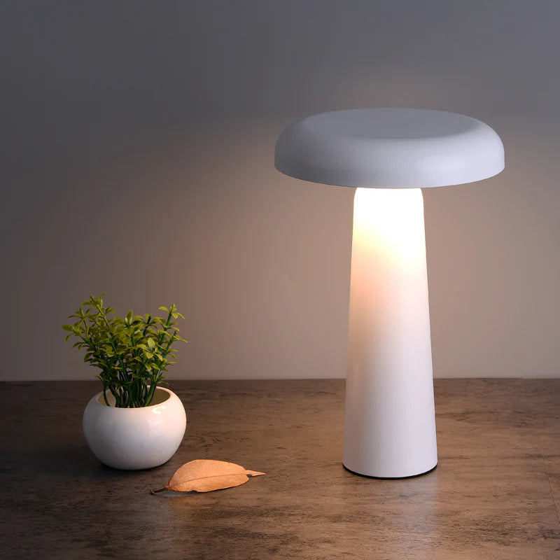 SPAZIO Boletus Rechargeable Dimmable Table Lamp – white lamp, lit, on a wooden table