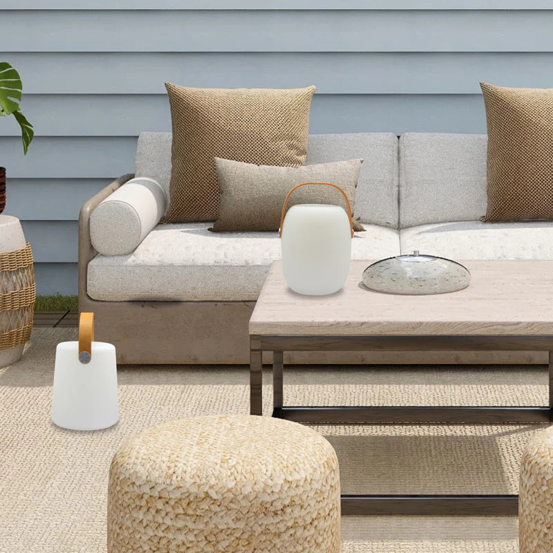 SPAZIO Bonbon 2 Rechargeable Table Lamp – lit lamps on an outdoor patio