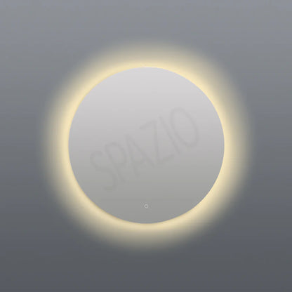SPAZIO Como Round Back-Lit LED Mirror – lit mirror with a warm glow on a grey wall