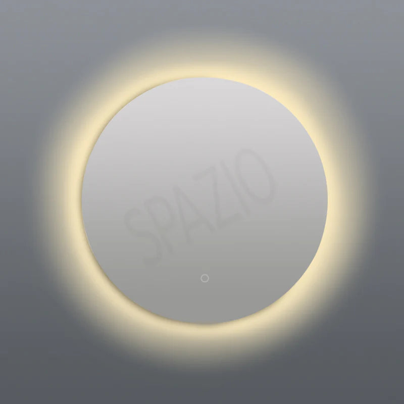 SPAZIO Como Round Back-Lit LED Mirror – lit mirror with a warm glow on a grey wall