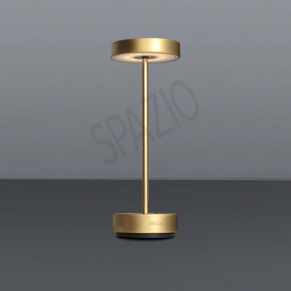 SPAZIO Standy Mini Rechargeable Desk Lamp – shown in gold on a grey background
