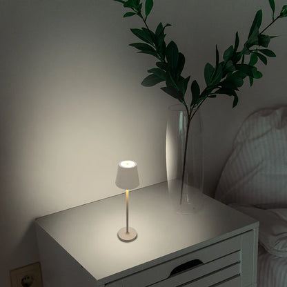 SPAZIO Trevi Micro Rechargeable Table Lamp – lit lamp on a bedside table