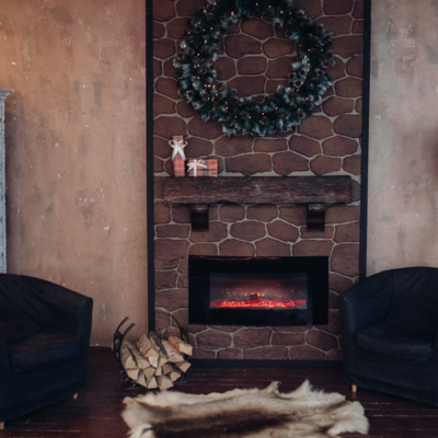 Synerji Panel Heater with 3D Flame Effect – installed in a brick wall below a mantel