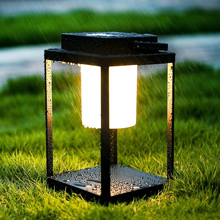 Synerji Solar LED Lantern – lit lantern on a lawn